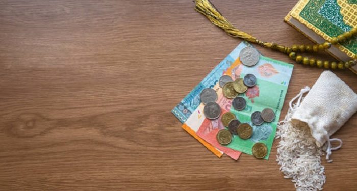 Hukum Zakat Fitrah dengan Uang