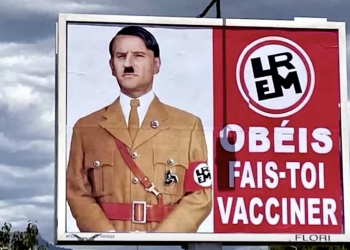 Papan Reklame di Prancis Samakan Presiden Macron dengan Hitler