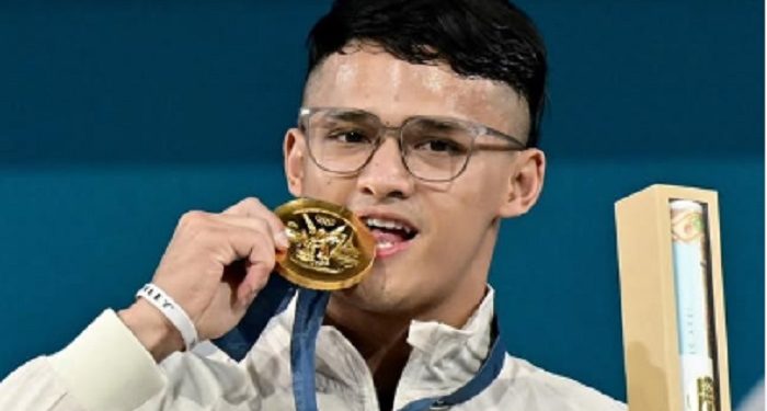Rizki Juniansyah Raih Medali Perak dan Perunggu pada Kejuaraan Dunia Angkat Besi 2024 di Bahrain