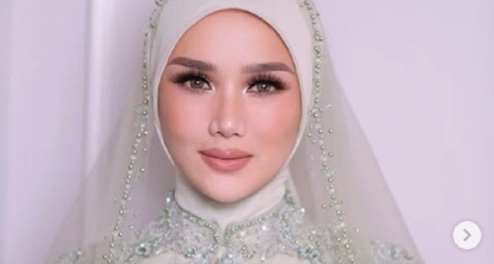 Mulan Jameela Kenakan Kebaya Mint saat Hadiri Akad Nikah Al dan Alyssa